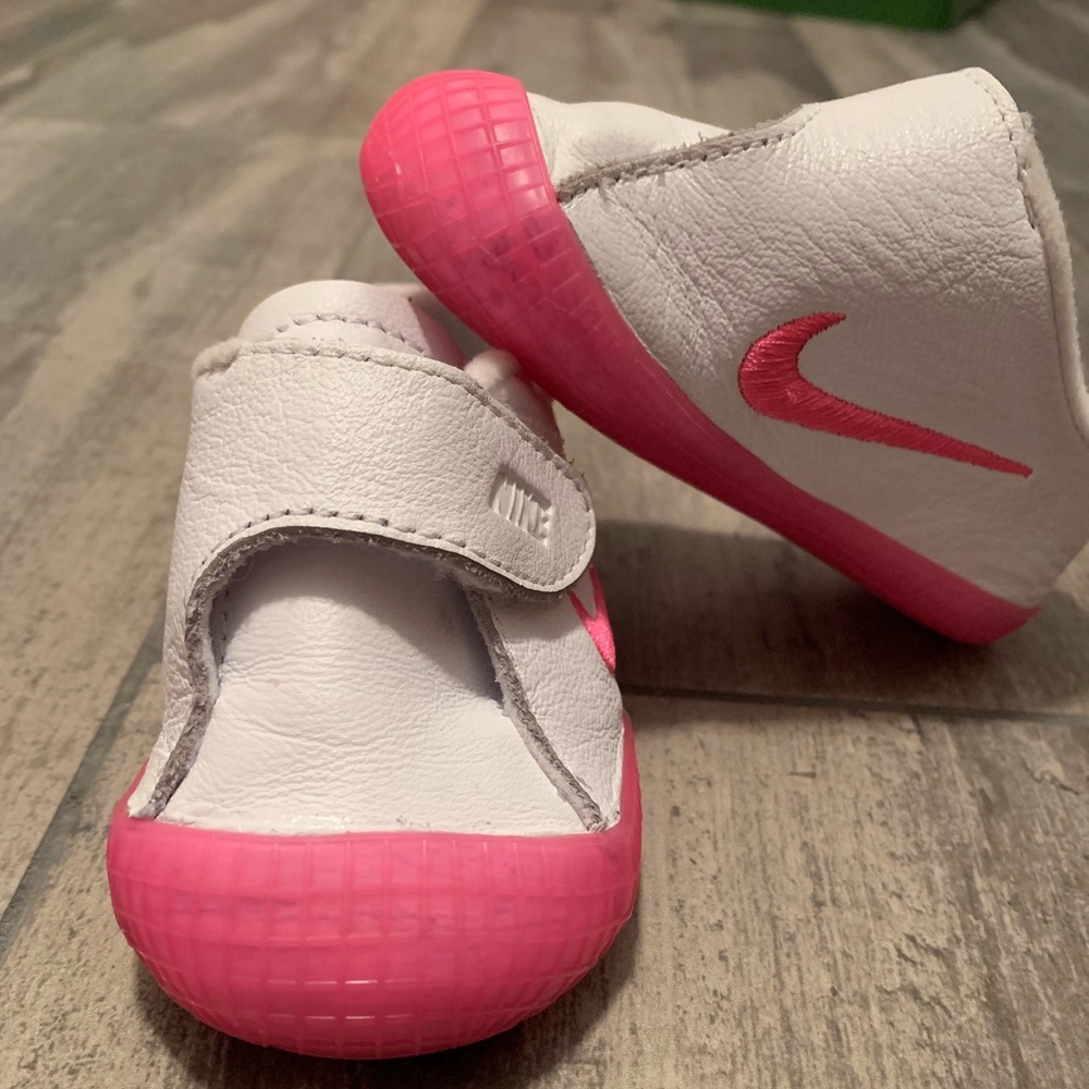 White infant Nike shoes